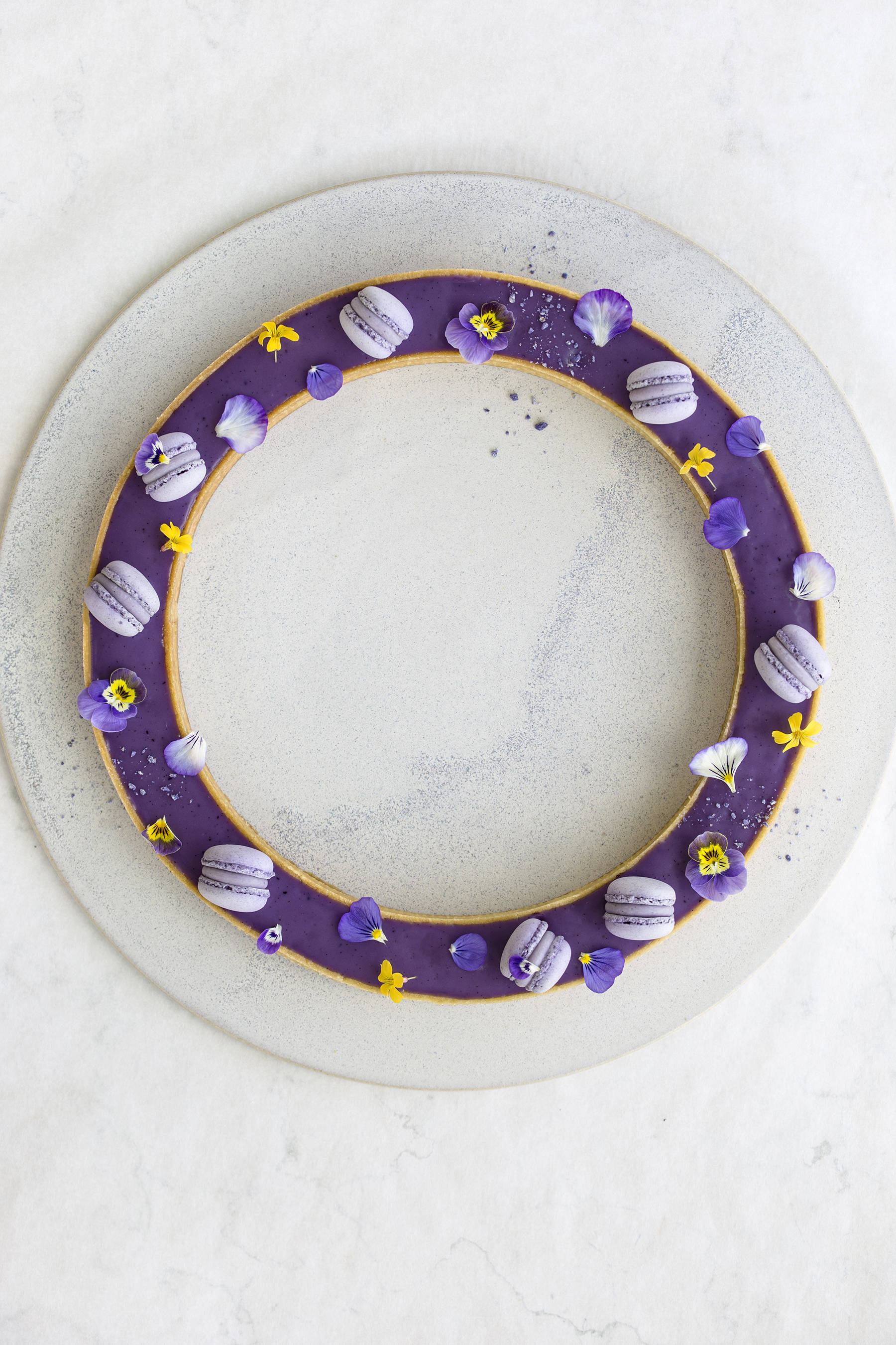 Blueberry tart with mini macarons