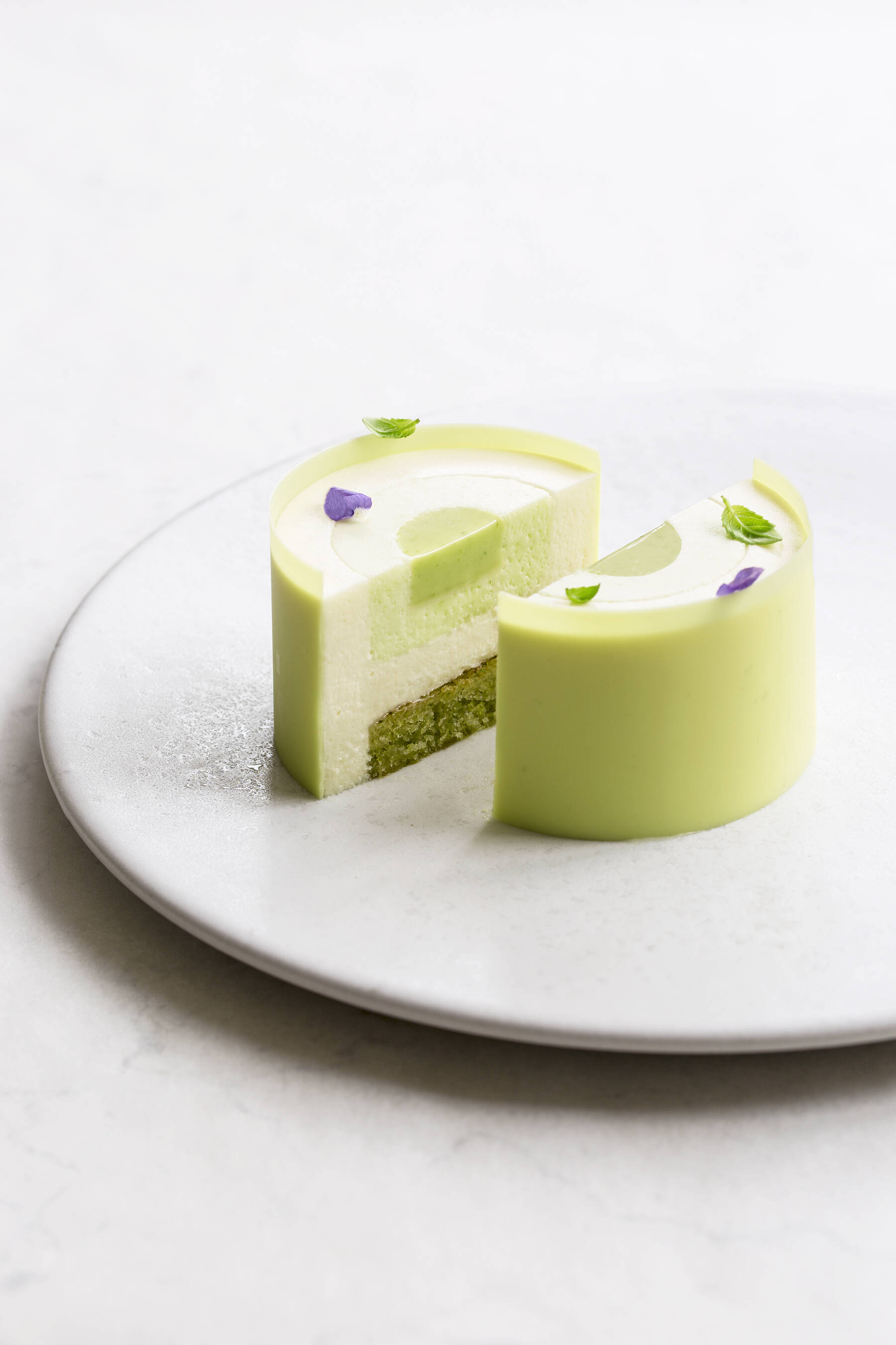 Lime cake with pistachio and basil