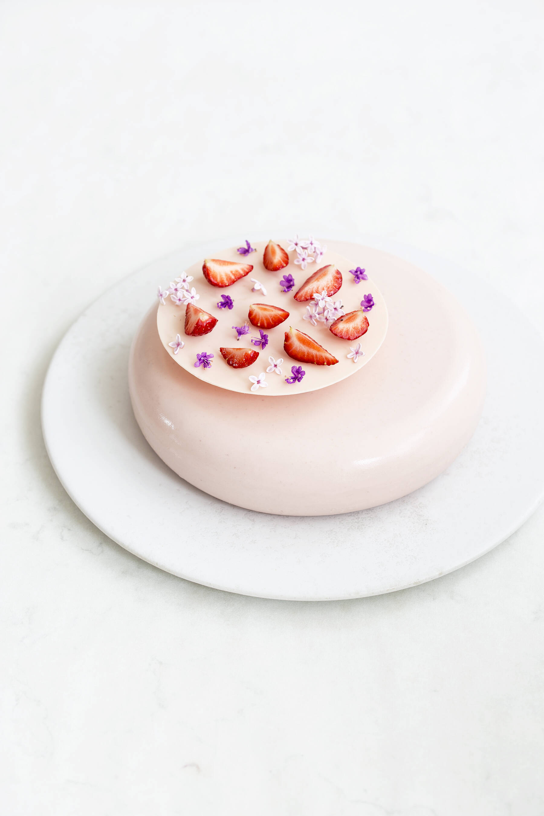 Strawberry hazelnut cake with basil