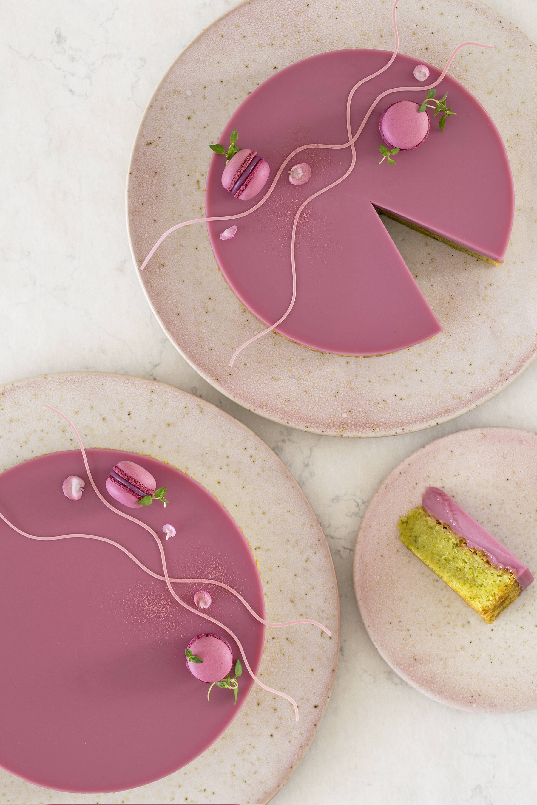 Pistachio cake with raspberry, thyme, and lime