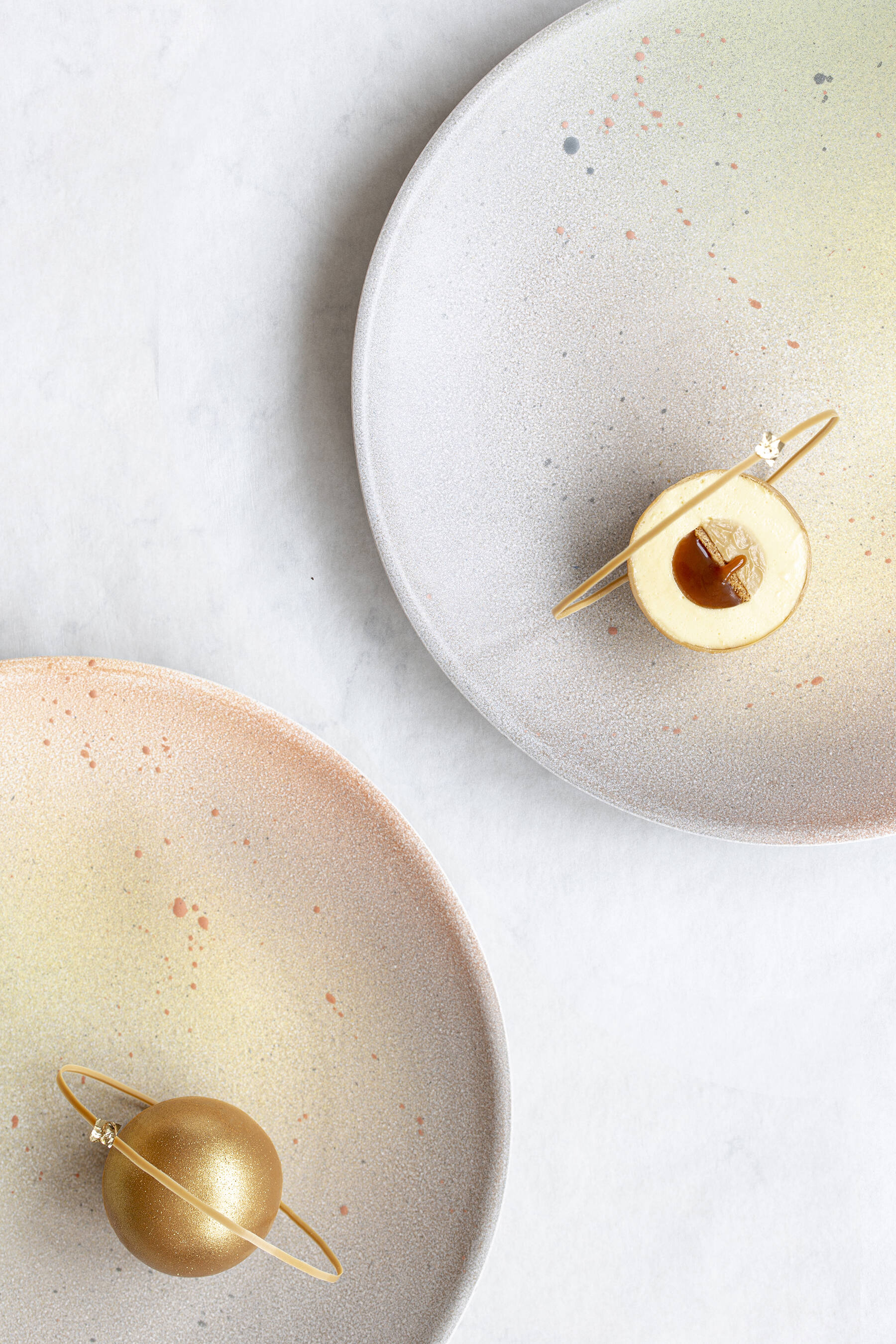 Golden planet with passion fruit and caramel