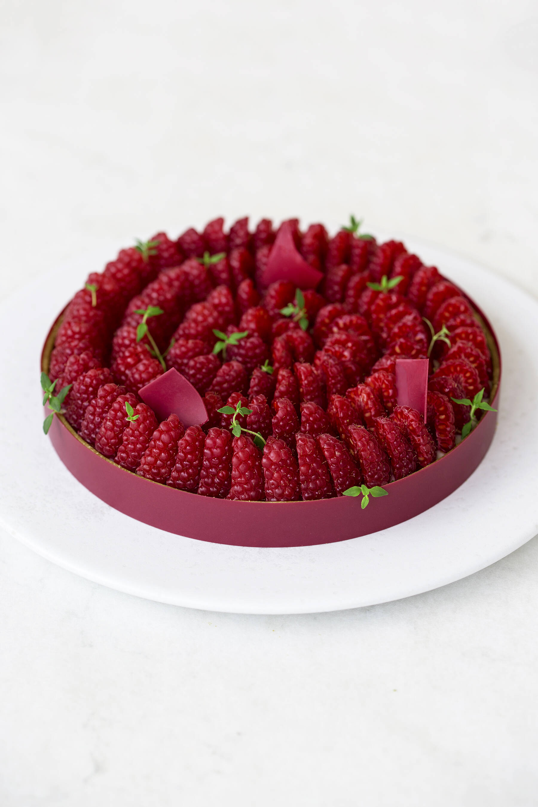 Raspberry pistachio thyme tart